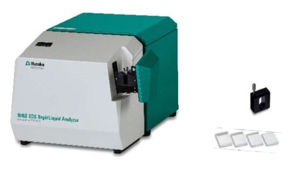The Metrohm NIRS XDS RapidLiquid Analyzer with used cuvettes and cuvette spacer.