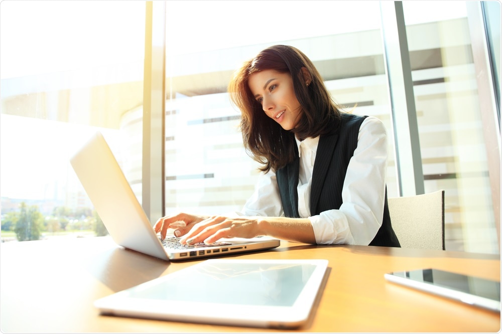 Woman working at office desk