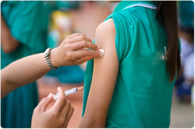 Girl receiving HPV vaccine