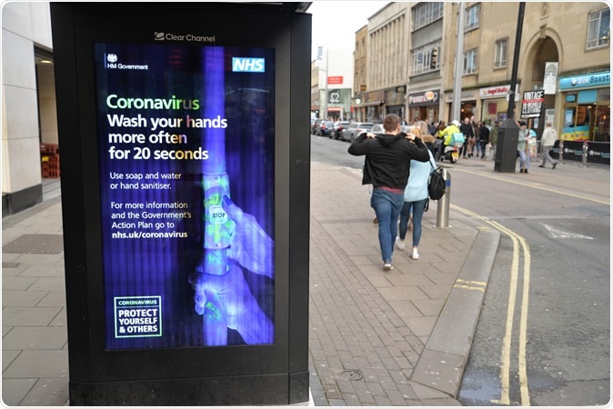 Bristol, England – Coronavirus (COVID-19) Health Information and Advice from the NHS (National Health Service). Image Credit: Kollawat Somsri / Shutterstock