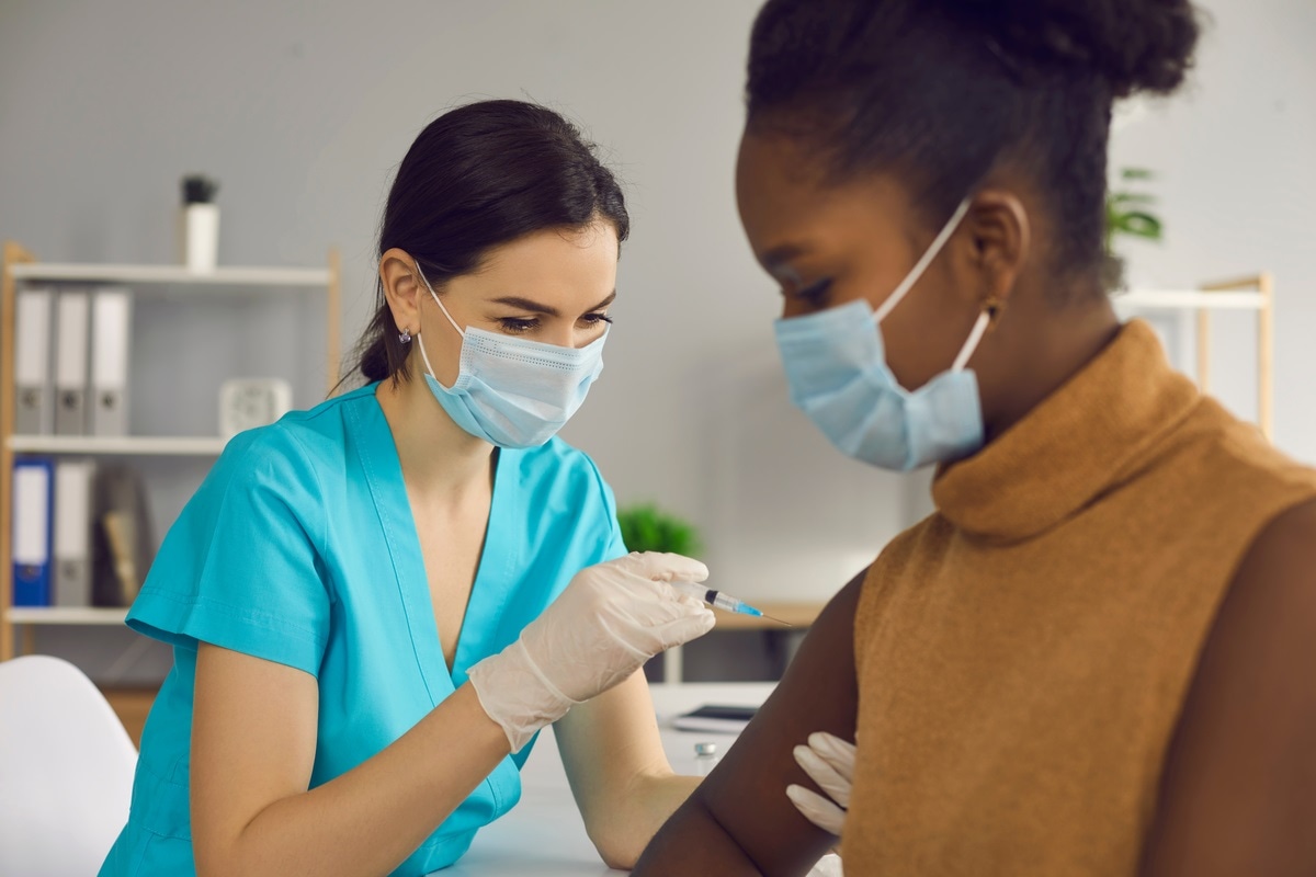 Study: Racial and ethnic differences in COVID-19 vaccine hesitancy and uptake. Image Credit: Studio Romantic / Shutterstock