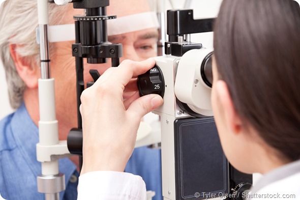 Optometrist doing sight testing for pateient