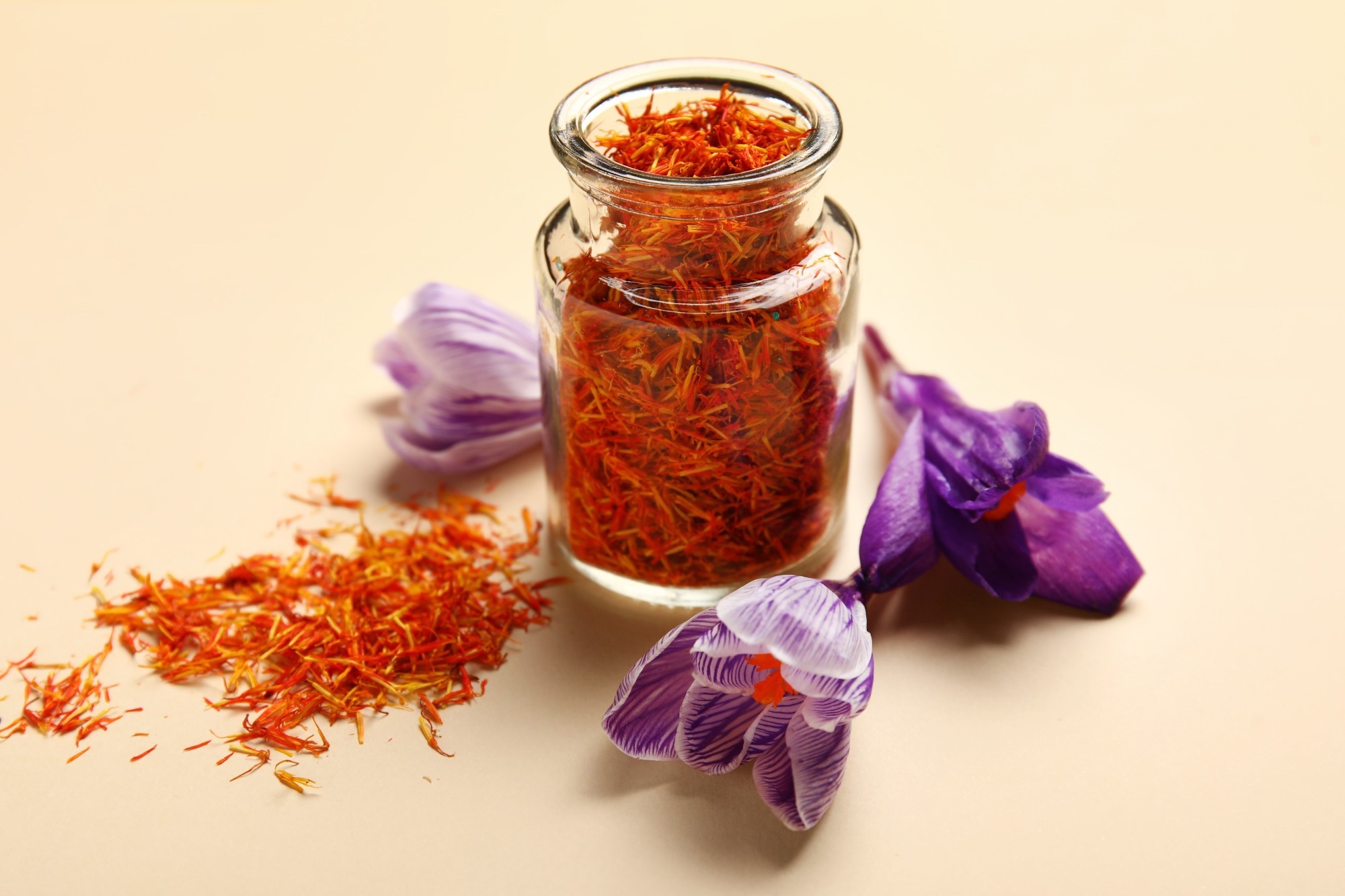Dried saffron spice with flower. Image Credit: Pixel-Shot / Shutterstock.com