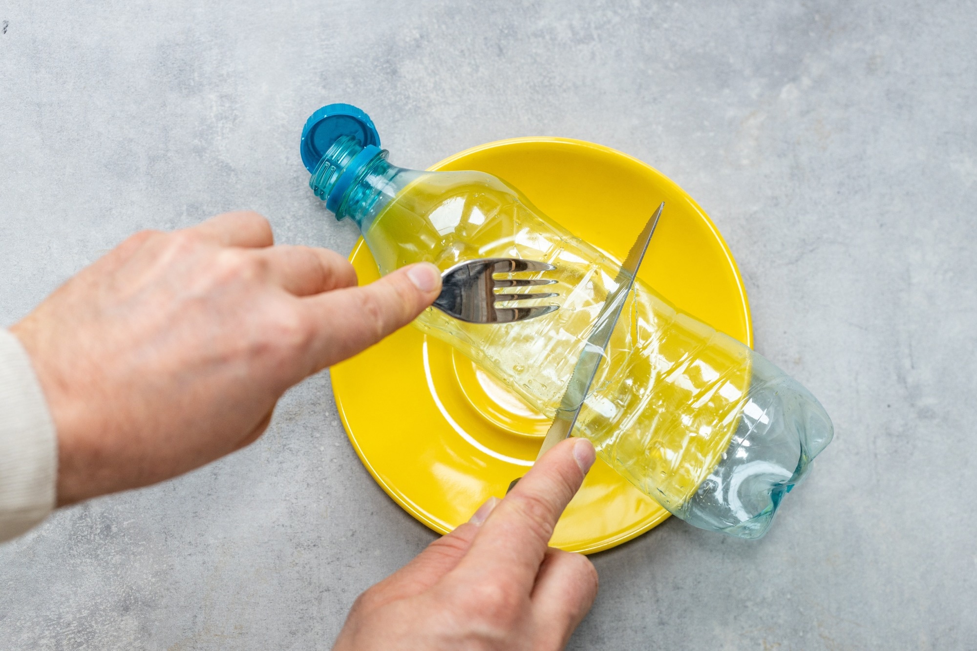 Plastic PET bottle on a plate.