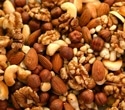 Swapping high-carb snacks for tree nuts cuts food cravings in young adults at metabolic risk